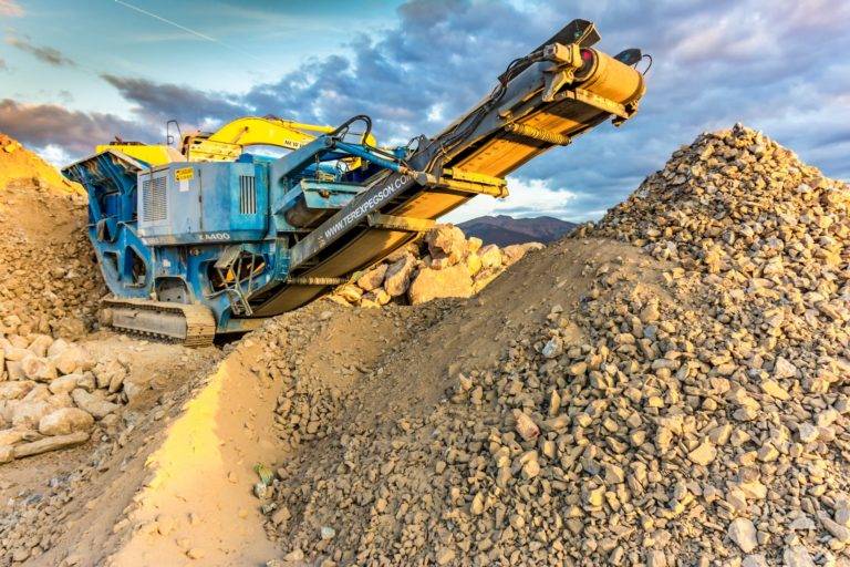 a stone crushing machine crushing concrete